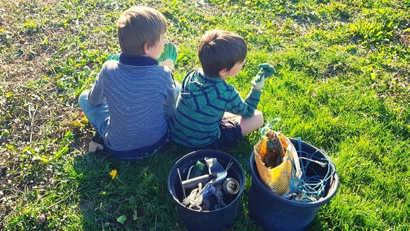 going green during lockdown picking litter with kids